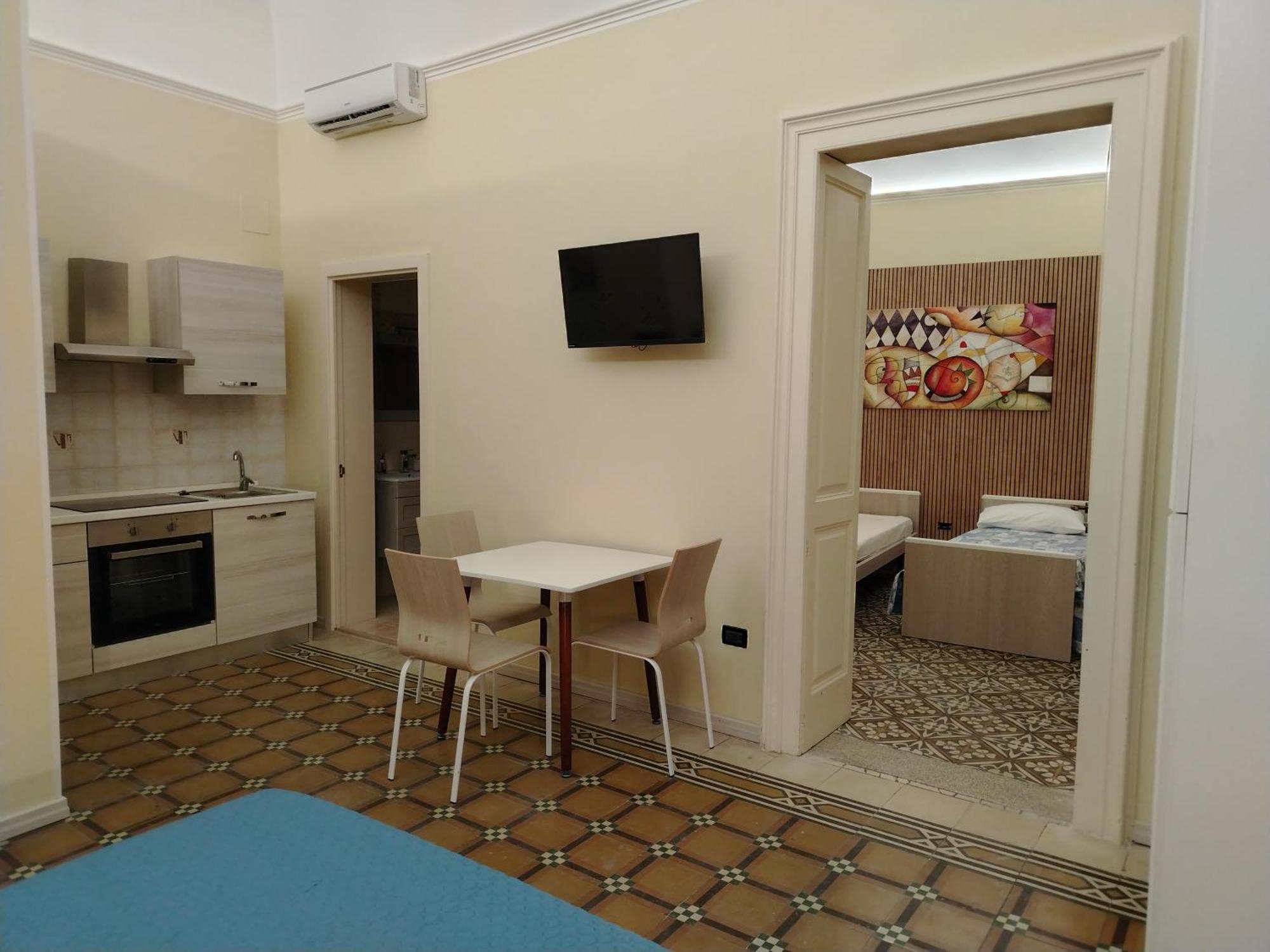 לינה וארוחת בוקר לצ'ה Palazzo Castellano חדר תמונה